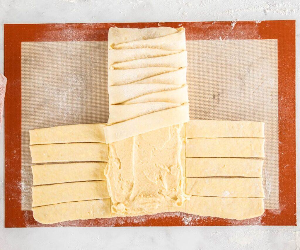 About half of the strip folded over the top of the almond filling.