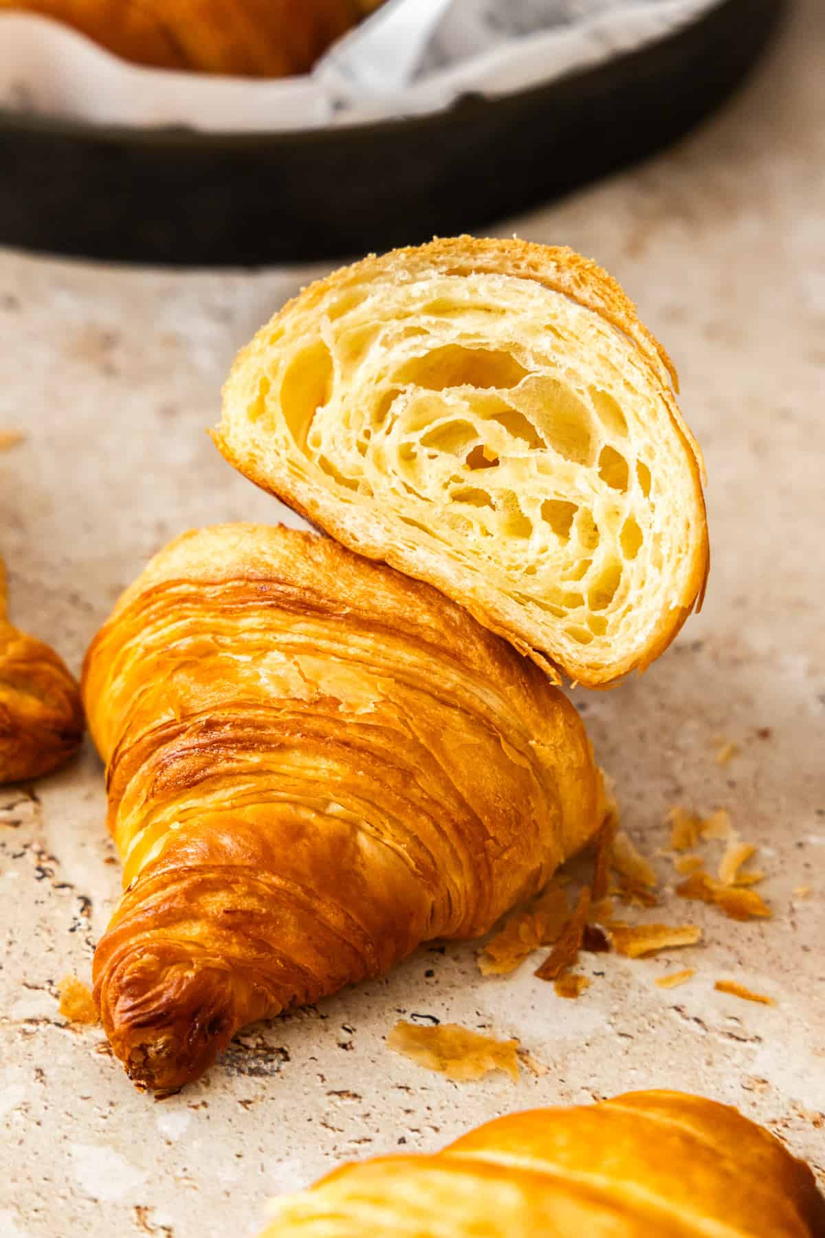 Closeup of the inside of a croissant to show the holes inside.