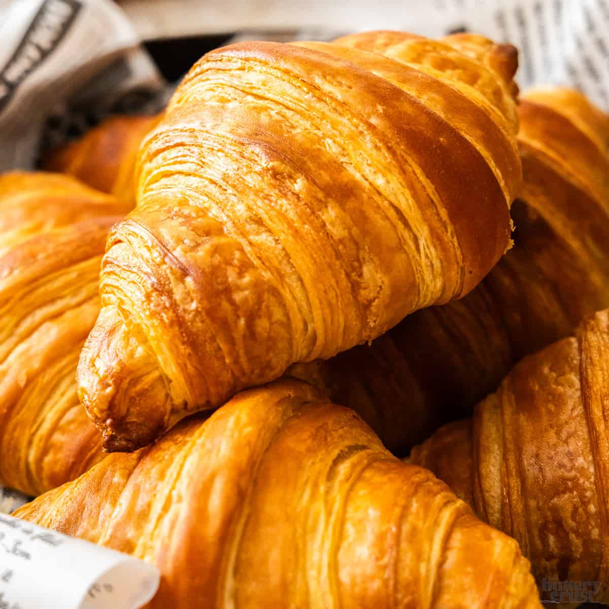 Closeup of a croissant turned sideways.