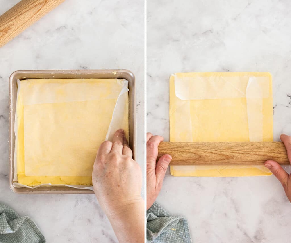 Two hands gently rolling the butter block.