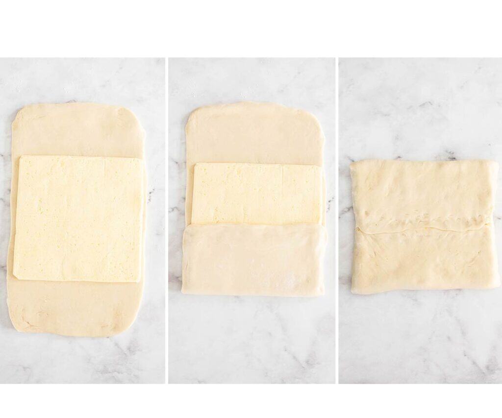 The butter block being folded into the dough.