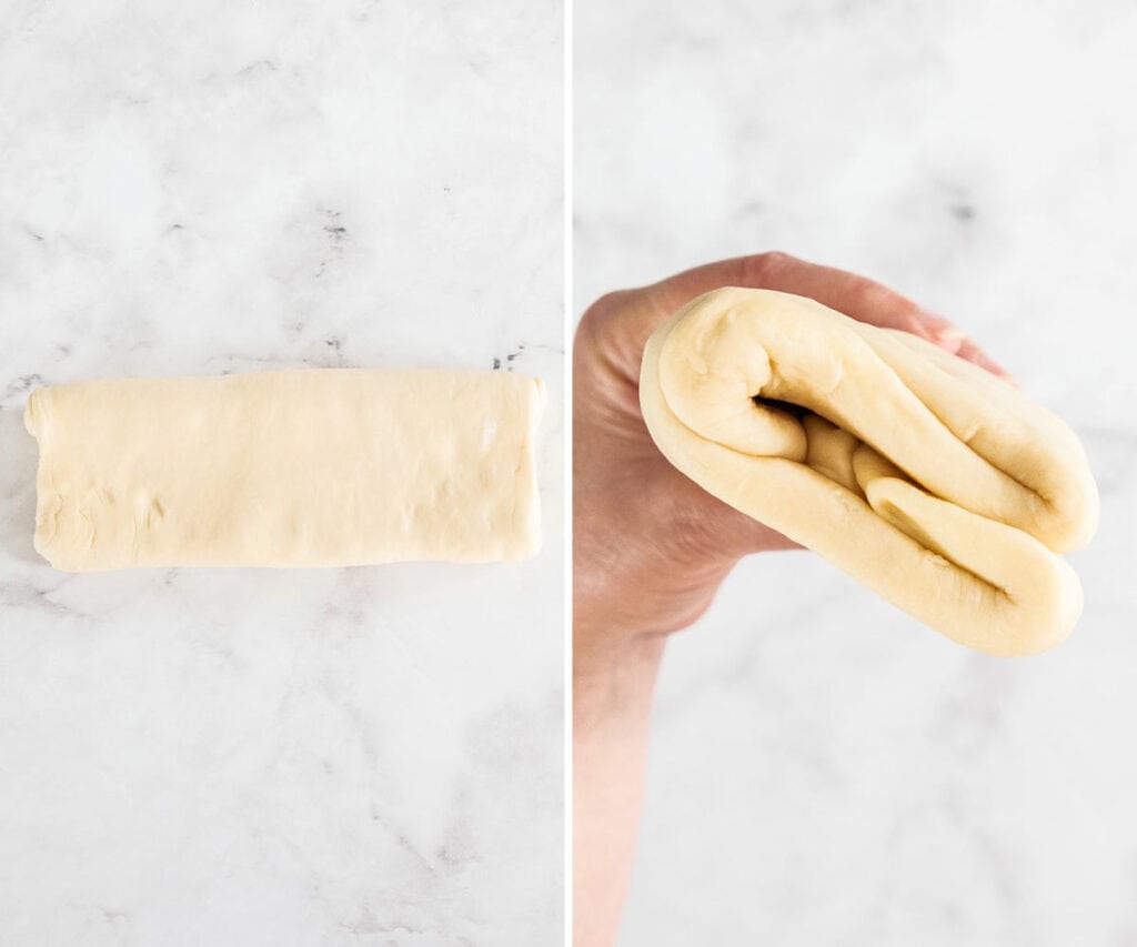 Two hands holding the dough up to the camera to show the bookfold.