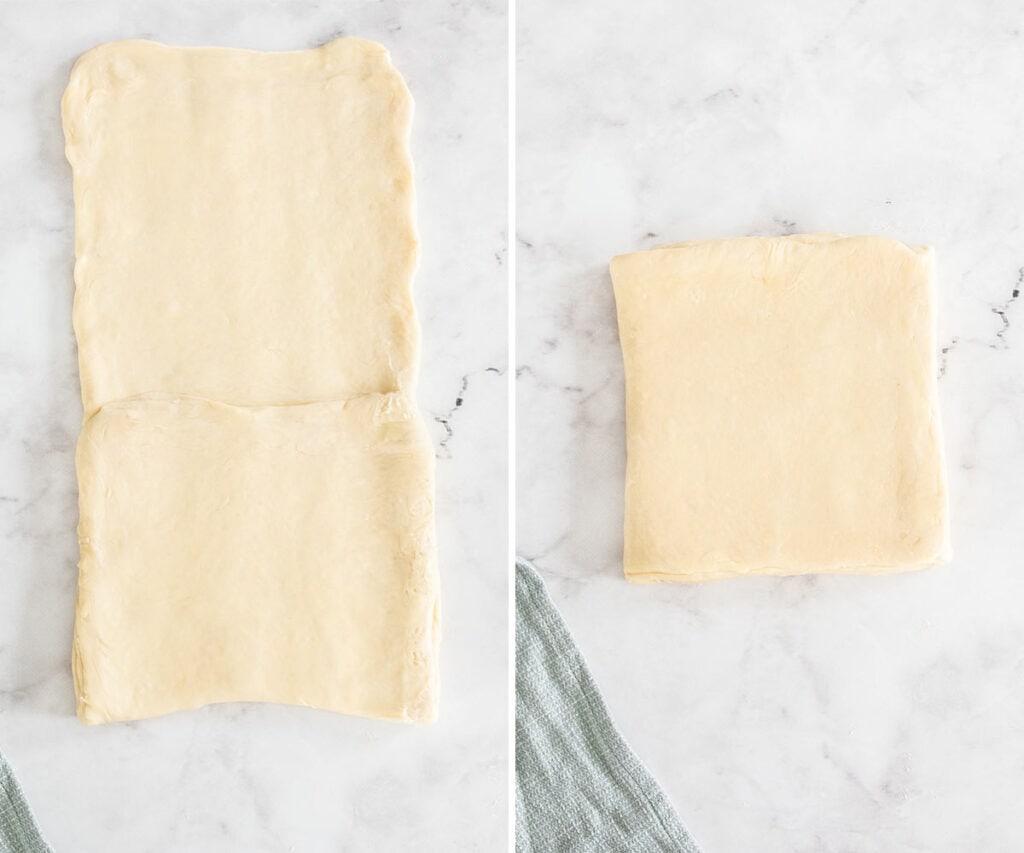 Rolled out dough being folded int thirds.