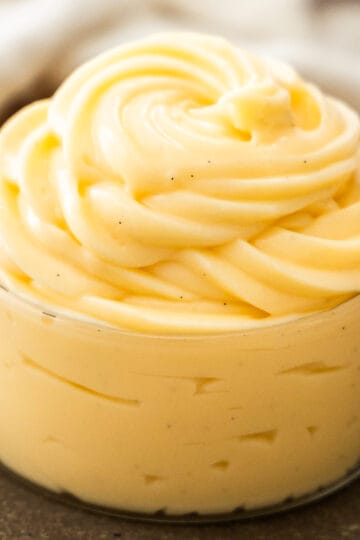 Extreme closeup of vanilla pastry cream in a glass.