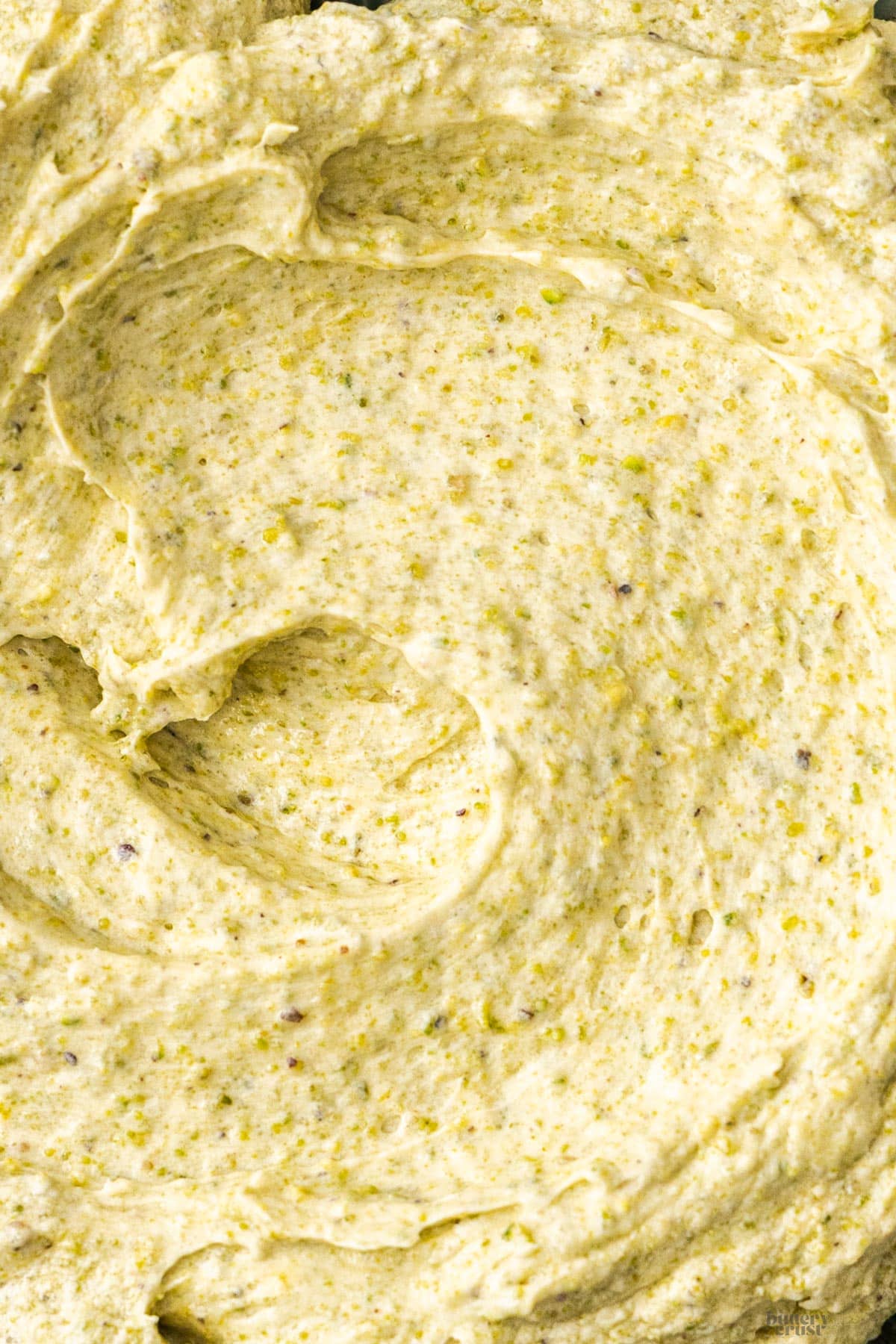 Extreme closeup of pistachio frangipane filling.