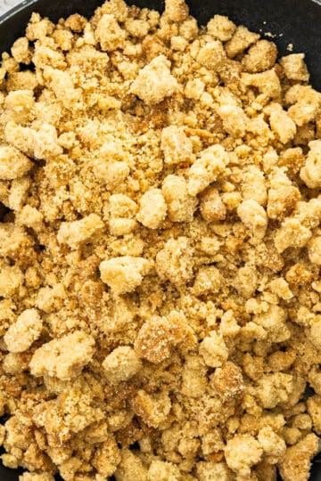 Top down view of crumble topping on a plate.