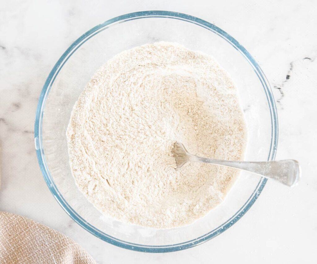 The dry ingredients in a mixing bowl.