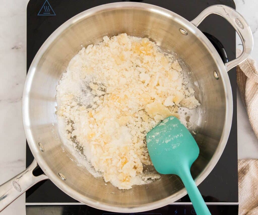 Sugar clumping in a saucepan.