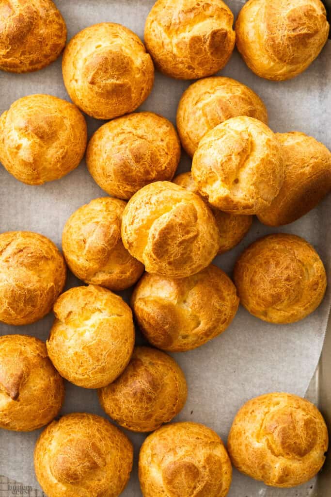 Top down view of a pile of choux buns.