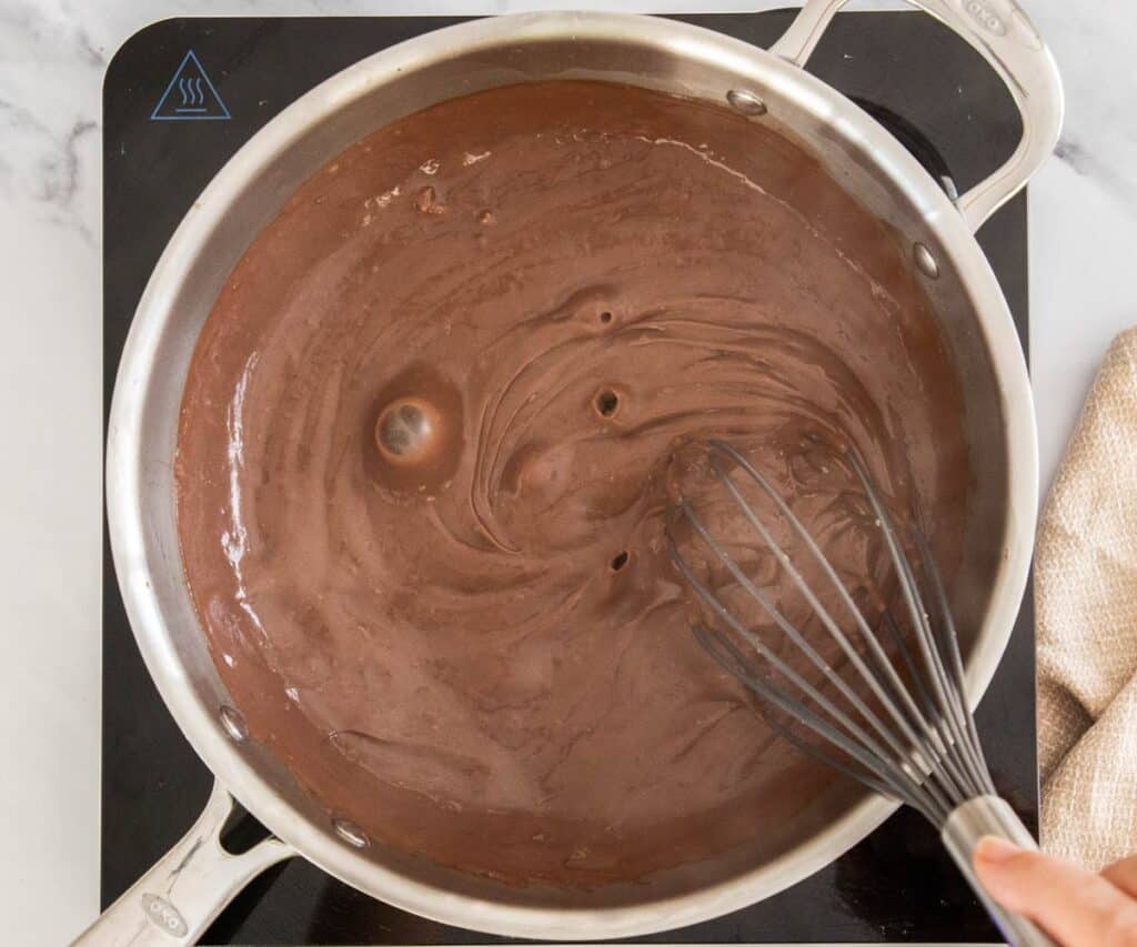 The chocolate custard bubbling in the pan.