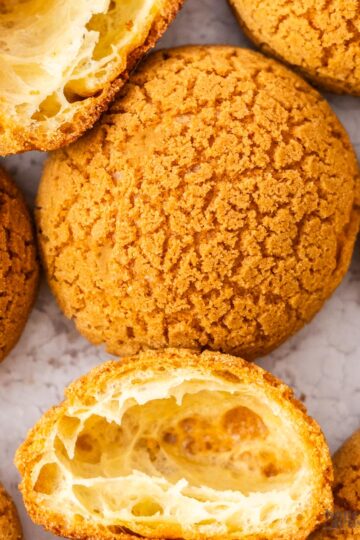 Top down view of the crackly top of a choux au craquelin.