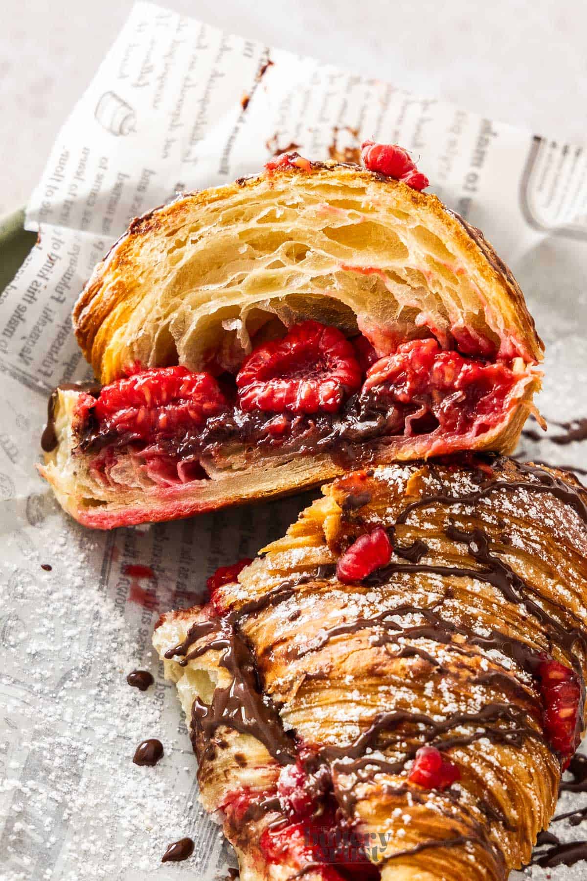 Closeup of the inside of a chocolate raspberry croissant.