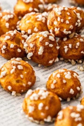 Closeup of a batch of chouquettes.