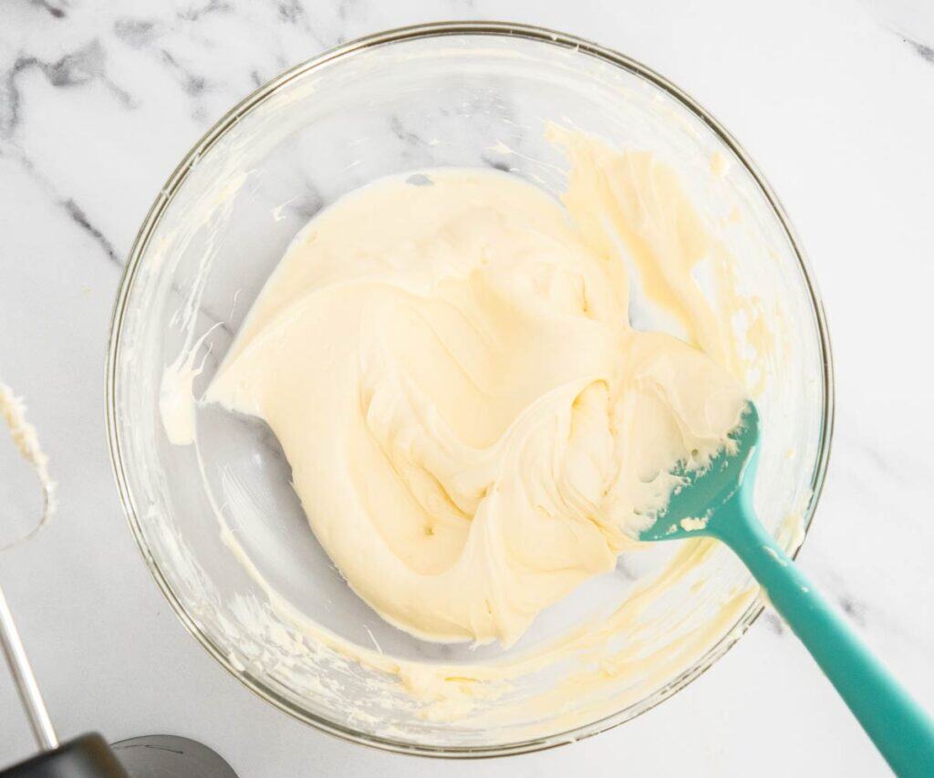 The cheesecake filling in a mixing bowl.