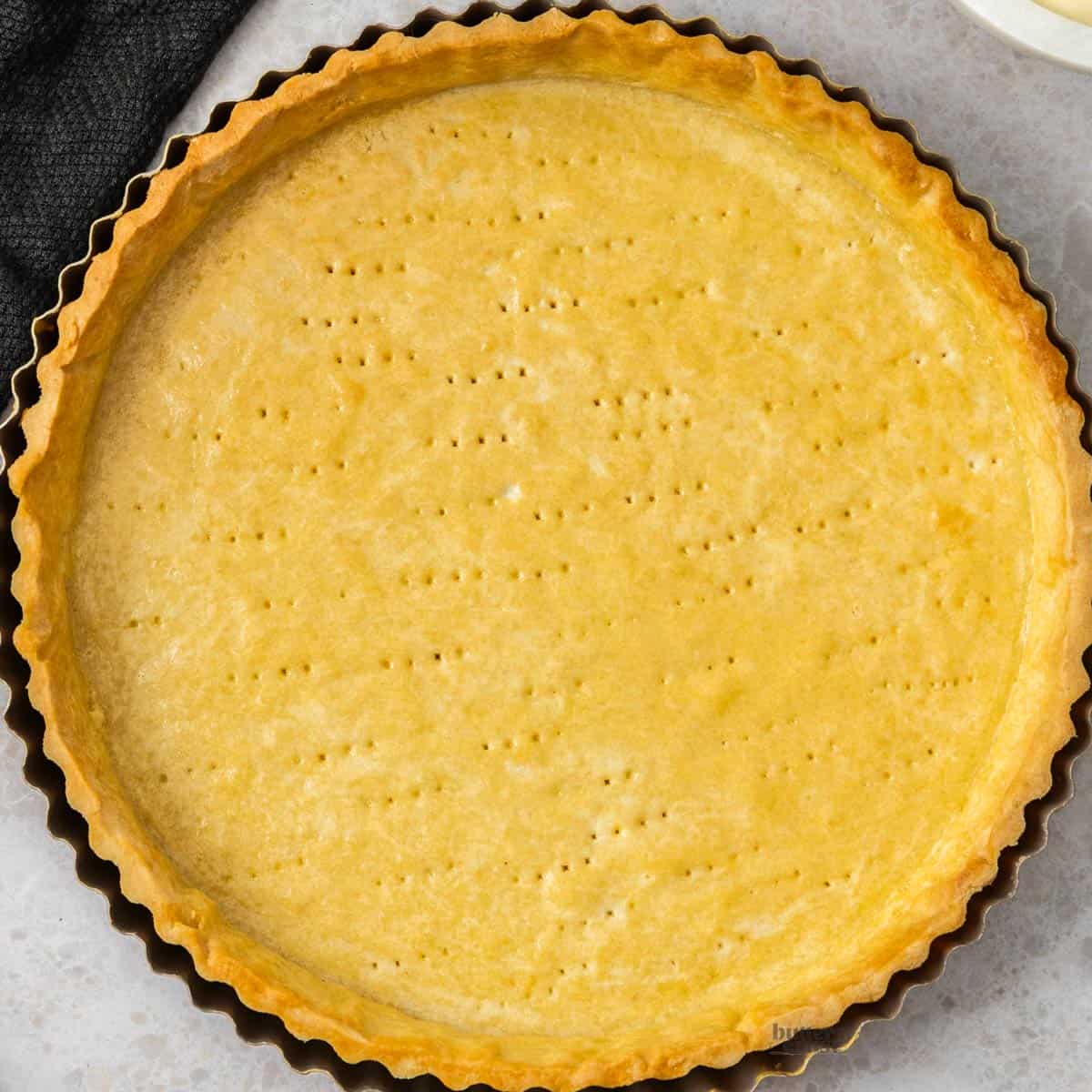 Top down view of a round pastry shell.