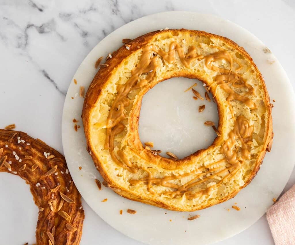 The inside of the choux ring drizzled with hazelnut praline paste.