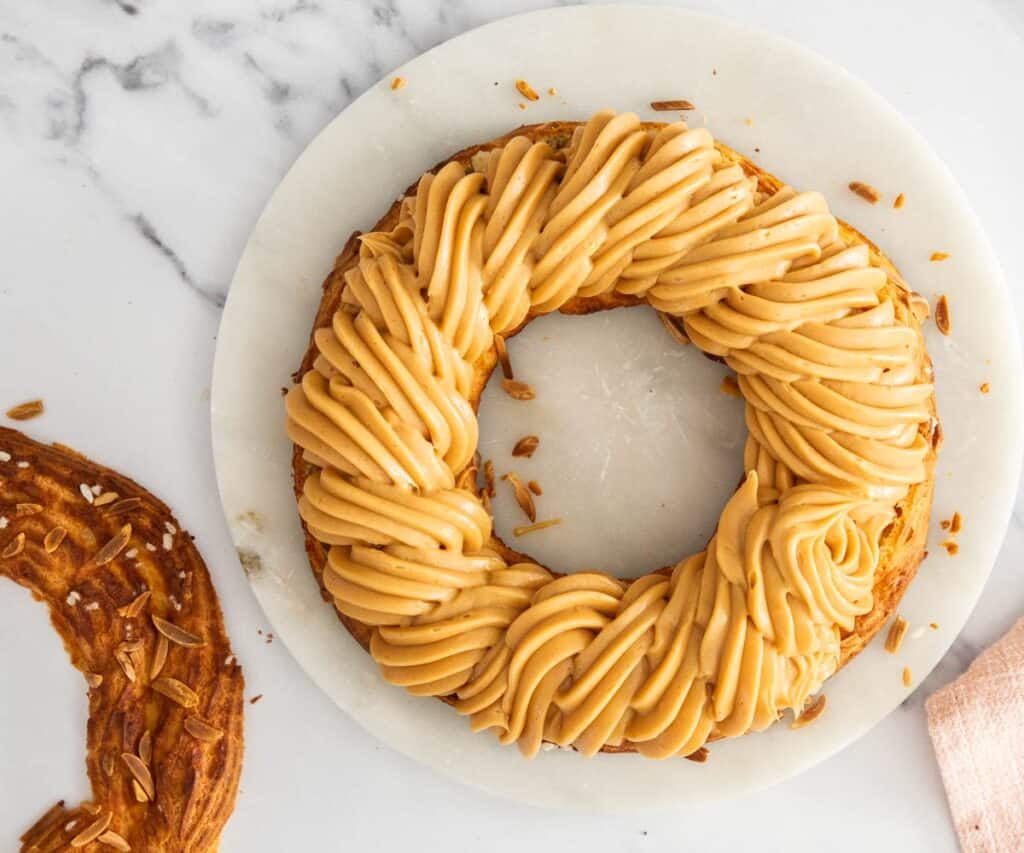 The choux ring piped with praline mousseline cream.