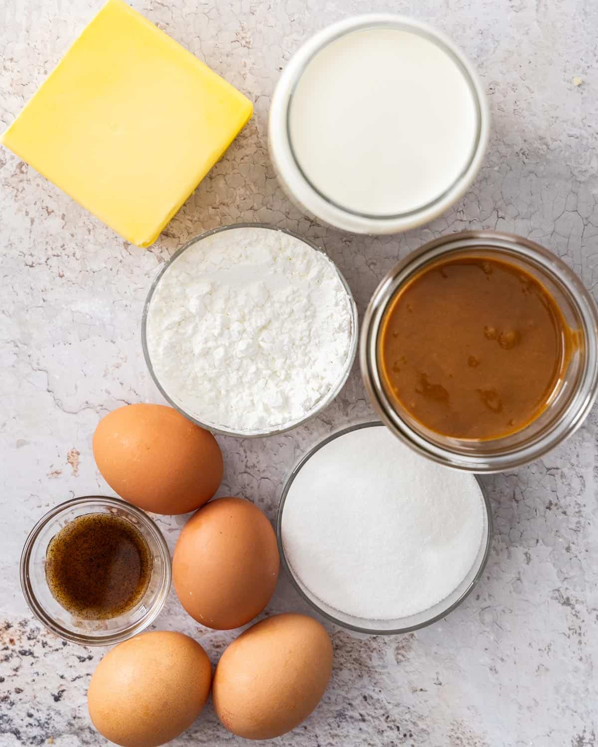 Top-down view of ingredients for creme mousseline au praline.