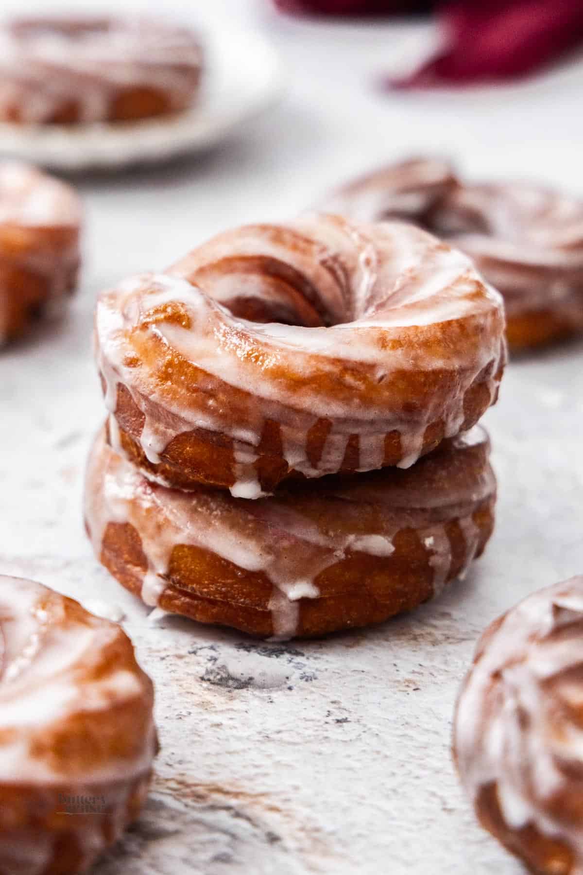 Two French crullers stacked.