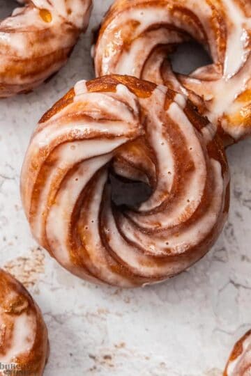 Top down view of 5 French crullers.