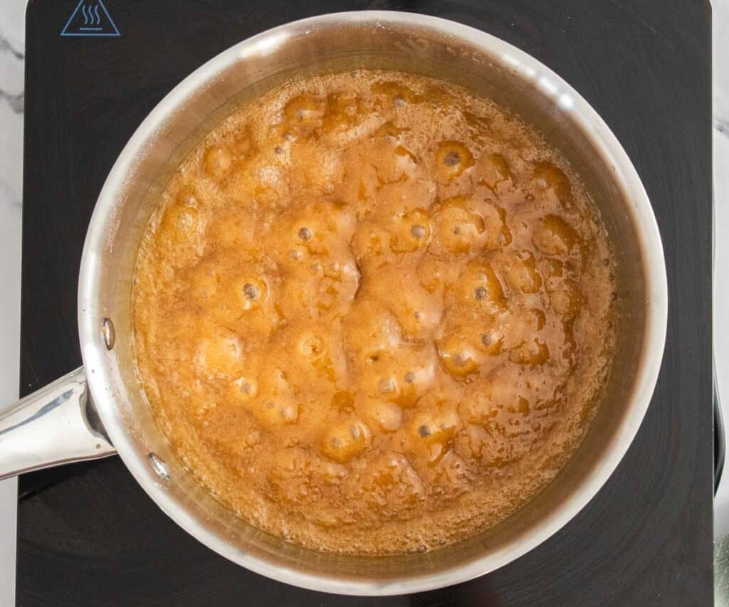 The butterscotch mixture bubbling in a pan.
