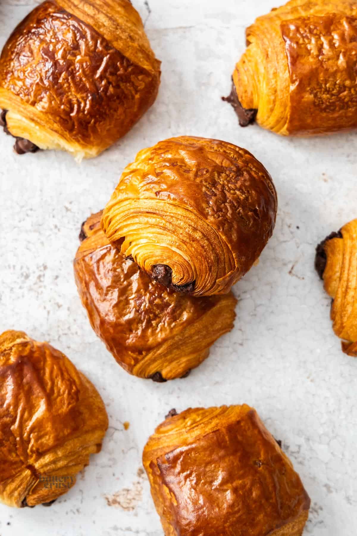 Top down view of a batch of pain au chocolat.