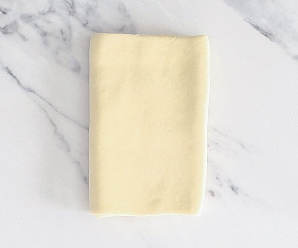 The pain au chocolat dough folded - double fold.