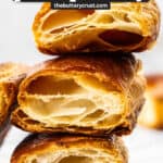 Three squares of puff pastry stacked.