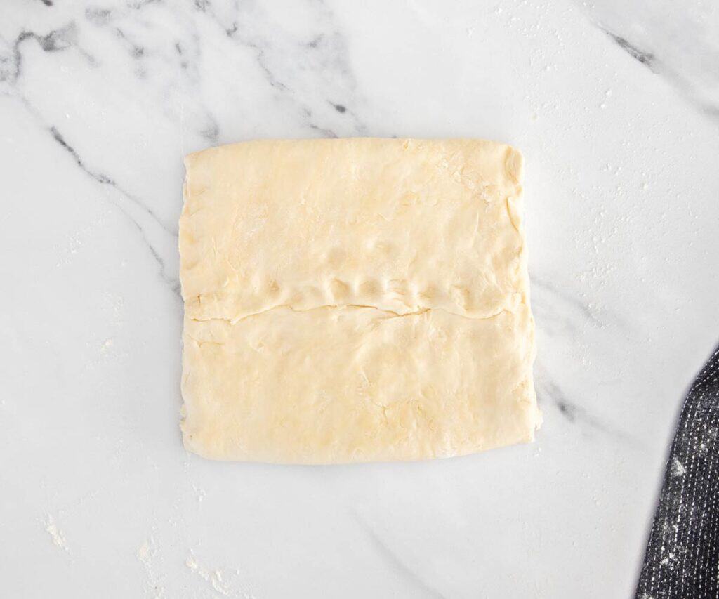 The butter enclosed in dough.